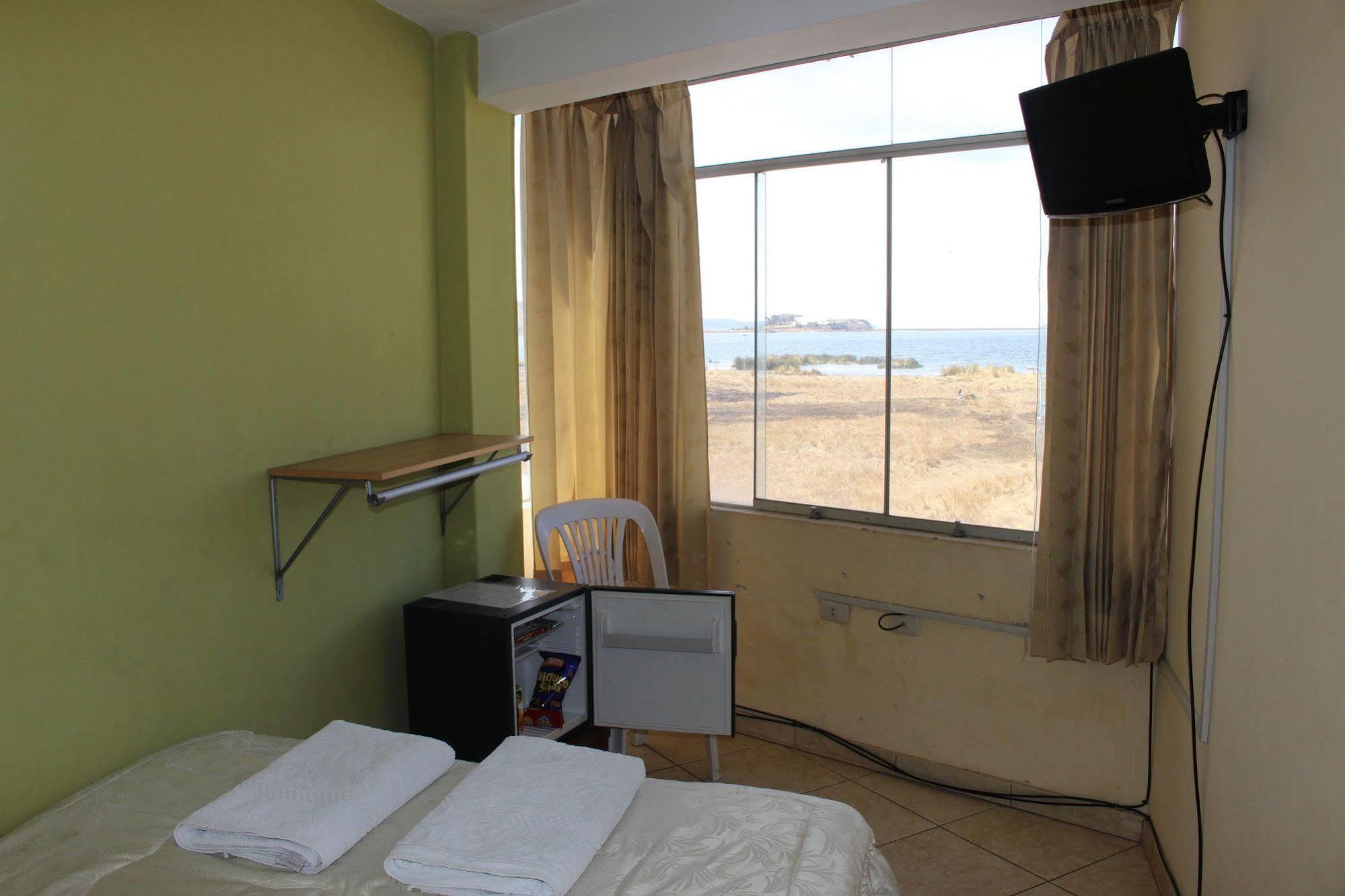 Posada De Percybal Lago Inn Puno Bagian luar foto